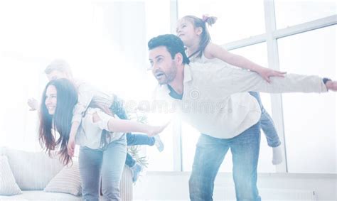 Happy Parents Play with Children at Home. Stock Photo - Image of female ...