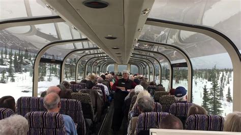 the inside of a bus filled with people