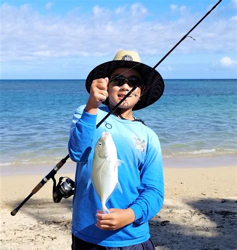 Guest Post: Young angler hooks omilu off the sardine pile! - Hawaii Nearshore Fishing