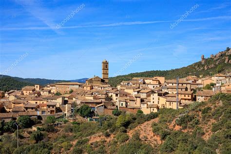 Aguero village at the foot of the dangerous and magnificent Mallos cliffs. Province of Huesca ...