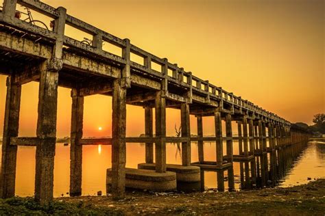 Premium Photo | Sunset over the u bein bridge in myanmar