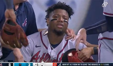 Video: Ronald Acuna Jr carted off after suffering leg injury on catch attempt