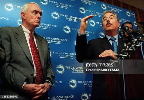 Colombian President Andres Pastrana speaks to reporters 26 January as ...