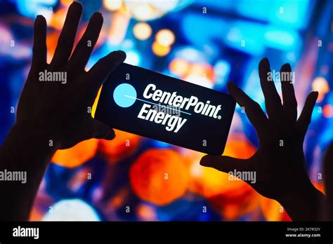 In this photo illustration, the CenterPoint Energy logo is displayed on ...