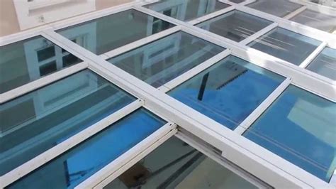 GLASSCON GmbH - RETRACTABLE GLASS ROOF WITH BULLET-PROOF GLASS & EXTERNAL SOLAR SHADES - YouTube