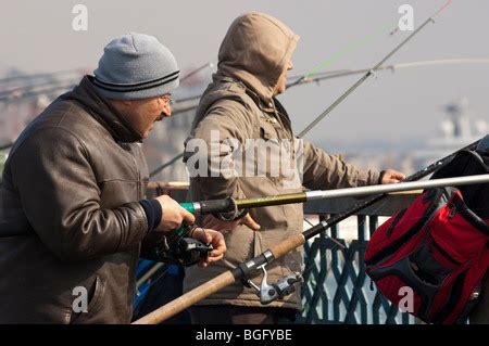 Fishermen on Galata Bridge in Istanbul Turkey Stock Photo - Alamy