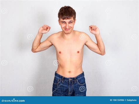 Weak Man Flexing His Muscles Stock Photo | CartoonDealer.com #35217402