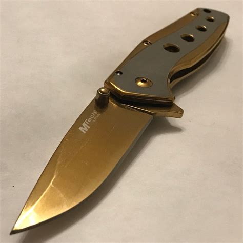 8" MTECH ASSISTED OPEN GOLD HANDLE BALLISTIC POCKET KNIFE MTA1044GD