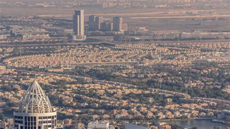 Houses and Villas in Jumeirah Islands Community District with Top of JLT Skyscrapers Timelapse ...