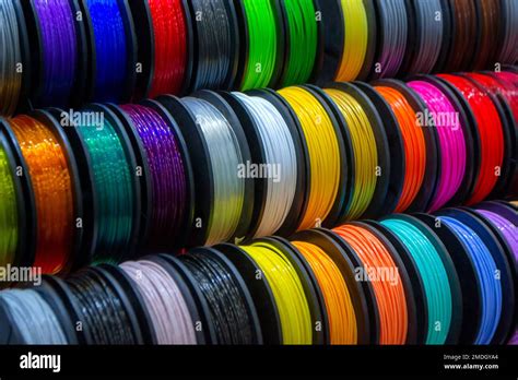 Many multi-colored spools of thread of filament for printing 3d printer ...