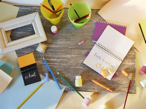 Notebook, Art and Stationery Materials, a Frame on a Wooden Table Stock Image - Image of ...