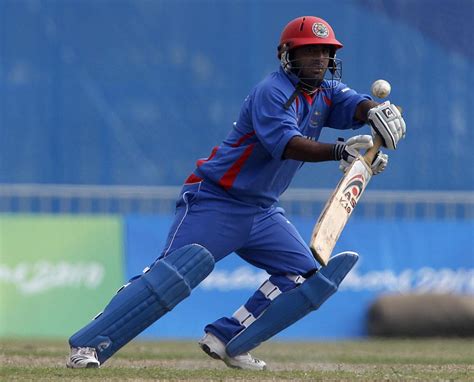 Mohammad Shahzad century powers Afghanistan to four-wicket win