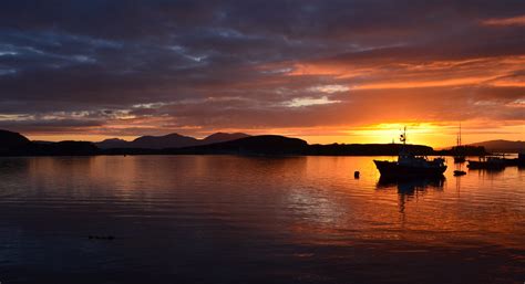 Sunset swim | Sunset over Oban Bay and the Isle of Kerrera a… | Flickr