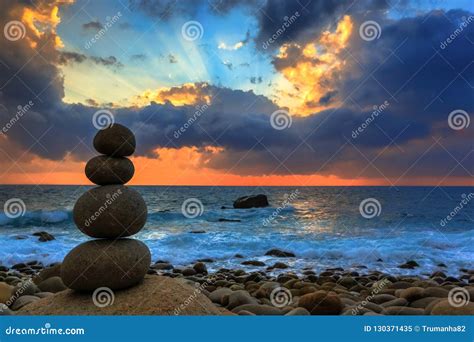 Nature Seascape with Zen Stacked Rocks on Beach at Colorful Sunrise ...