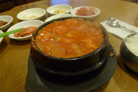 Bubbling Cauldron | a still boiling clay pot of kimchi soft … | Flickr