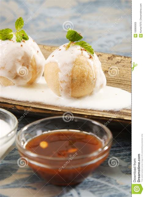 Indian Chaat Dahi Bhalle with Curd and Sweet Sauce Stock Image - Image of chaat, hollow: 100959303