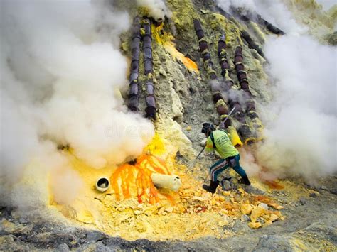 Sulfur Miner At Work Inside Crater Of Kawah Ijen, Indonesia Editorial Photo - Image: 42084771