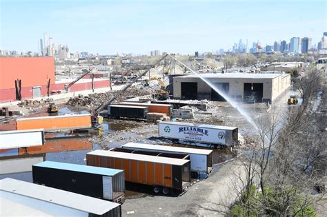 Jersey City firefighters remain at scene of Tuesday brush fire near ...