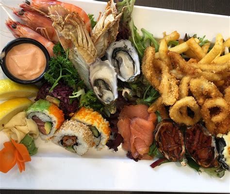 They call this a seafood platter for one! Gorgeously fresh seafood with three types of oysters ...