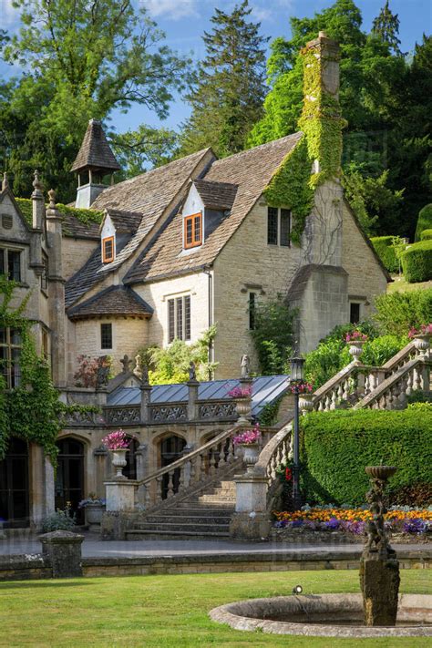 Manor House Hotel, Castle Combe, the Cotswolds, Wiltshire, England - Stock Photo - Dissolve