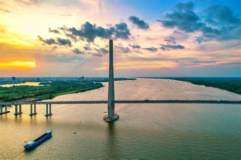 Premium Photo | Can tho bridge, can tho city, vietnam, aerial view sunset sky. can tho bridge is ...