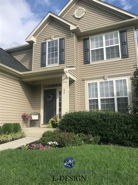 Beige or tan siding with cream trim and Benjamin Moore Temptation shutters, front door. Kylie M ...