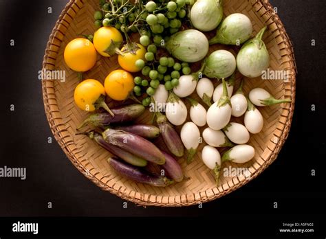 Aubergine varieties black background Stock Photo - Alamy