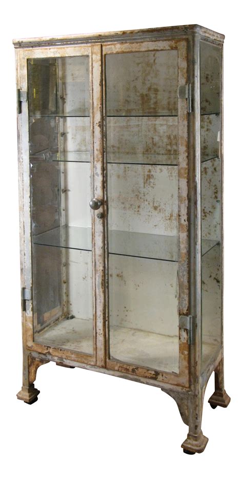 Antique Cast Iron & Glass Apothecary Cabinet on DECASO.com | Glass cabinet doors, Glass cabinets ...