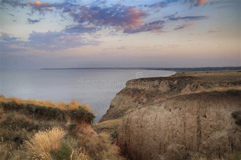 Sunrise at a Cliff stock photo. Image of ground, cloud - 99115040