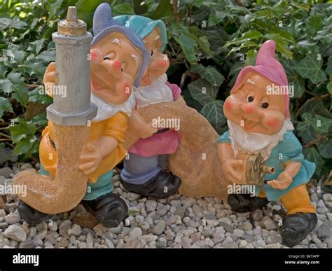 Funny garden gnomes hi-res stock photography and images - Alamy