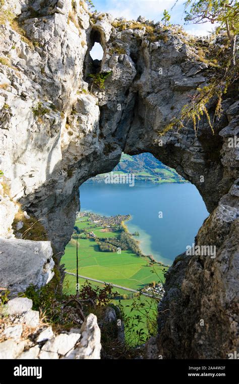 Mondsee: lake Mondsee, rock hole Drachenloch in Salzkammergut, Salzburg ...