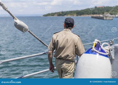 Officer in Uniform on the Deck of a Warship. Editorial Stock Photo - Image of cruiser, head ...