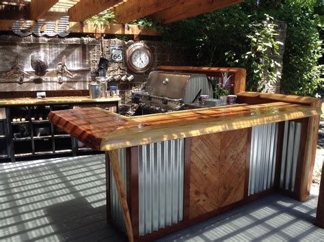 Rustic outdoor kitchen and bar. | Rustic outdoor kitchens, Outdoor ...