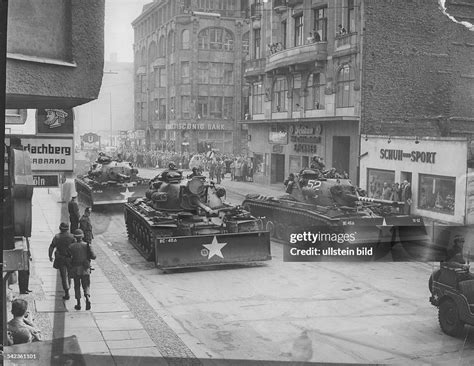 Germany / GDR, Berlin. The building of the wall. US tanks at... News ...