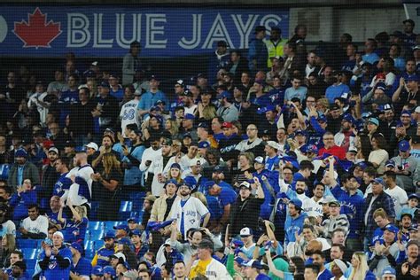 Toronto fans gather to cheer on the Blue Jays in wild-card opener