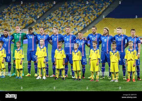 Players of National football team of Iceland listen National anthems ...