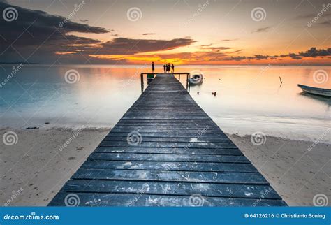 Jetty during sunset stock photo. Image of cloudscape - 64126216