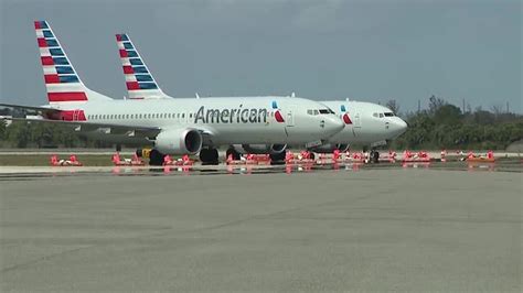 American Airlines flight attendants picket for higher pay, better hours ...