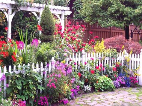 white picket fence garden - Google Search | English cottage garden, Cottage garden design ...