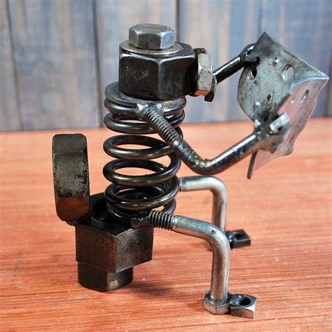 Im Busy! www.therustybolt.net | Welding art, Welding art projects, Metal art projects