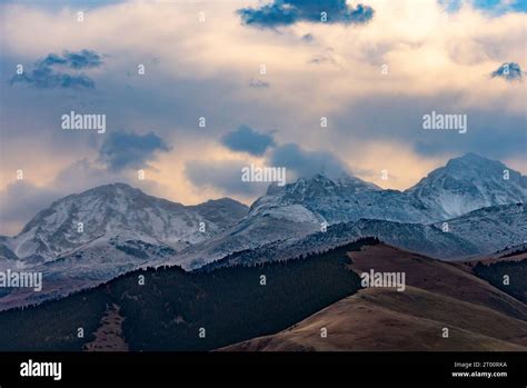 Snowy mountain ranges in Kyrgyzstan Stock Photo - Alamy