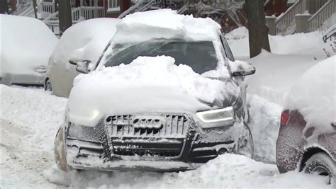 Storm dumps nearly 30 centimetres of snow on Montreal | CBC News