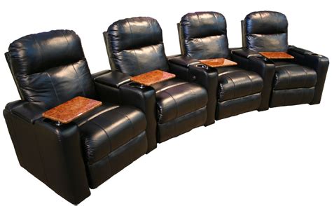 four recliner chairs with brown cushions sit side by side in front of each other