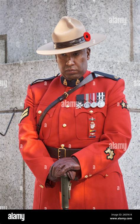 Halifax, Canada. November 11th, 2022. RCMP officer in traditional red uniform standing guard at ...