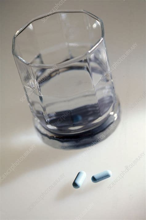 Pills with Water - Stock Image - C007/5477 - Science Photo Library