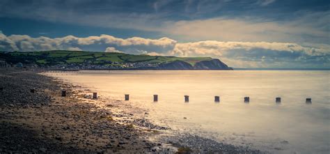 Free Images : beach, landscape, sea, coast, nature, sand, ocean, horizon, post, cloud, sky ...