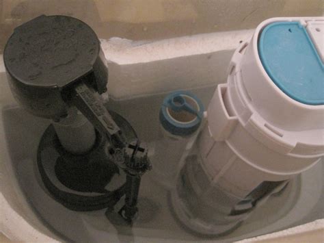 Why does this toilet fill valve leak around the top? - Home Improvement ...