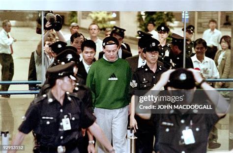 Rogue financial trader Nick Leeson arrives at Singapore's Changi... News Photo - Getty Images