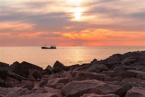 Fishing boat at sunset stock image. Image of beautiful - 50936827