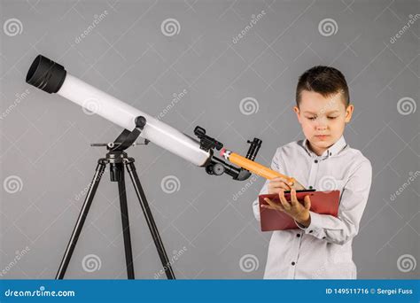 The Young Astronomer Shows Starry Sky While Standing At The Telescope ...